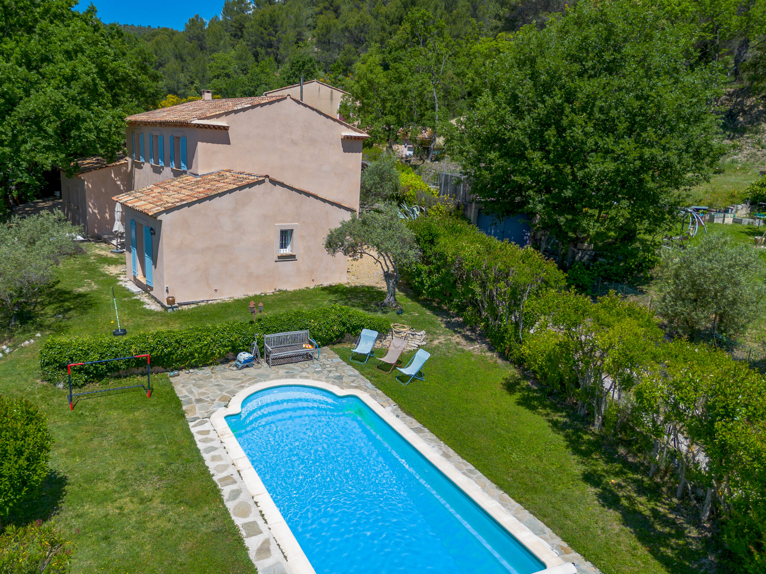 a pool in a backyard of a house