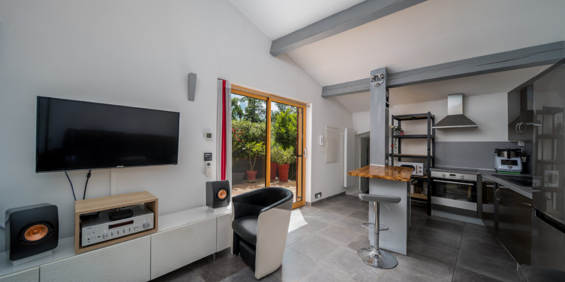 a room with a tv and a table